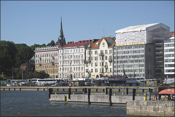 Covered market square (Avenue Etelaranta) and behind the bell tower of the German Church of Helsinky