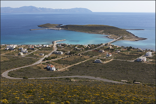 South east coast. Dhiakofti harbor and the island of Makrykythira. On the horizon, the coast of Peloponnese