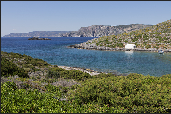 Limnionas bay (west coast), below the village of Mylopotamos