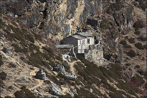 House of a monk on the wall of Mount Nangkar Tshang House of a monk on the wall of Mount Nangkar Tshang