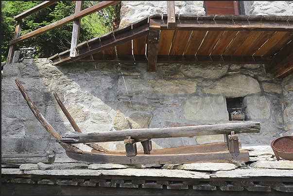 Village of Gruba (1550 m). An old sledge of wood Village of Gruba (1550 m). An old sledge of wood