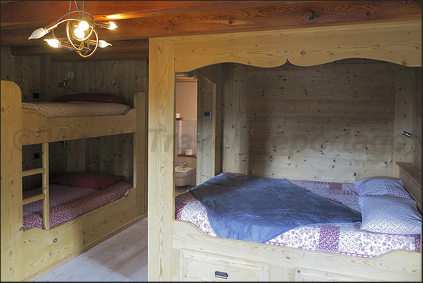 Gruba refuge. The wood is the main element of the alpine furnishings Gruba refuge. The wood is the main element of the alpine furnishings
