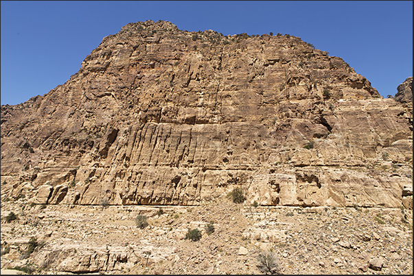 The trail from Dana village to Feynan crosses the reserve between high rock walls where there are some Nabatean tombs The trail from Dana village to Feynan crosses the reserve between high rock walls where there are some Nabatean tombs