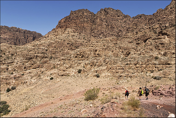 The trail from Dana village to Feynan crosses the reserve between high rock walls where there are some Nabatean tombs The trail from Dana village to Feynan crosses the reserve between high rock walls where there are some Nabatean tombs