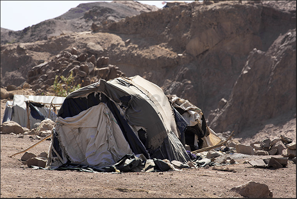 At the end of the valley, meet the tents of nomadic shepherds living on the edge of the desert At the end of the valley, meet the tents of nomadic shepherds living on the edge of the desert