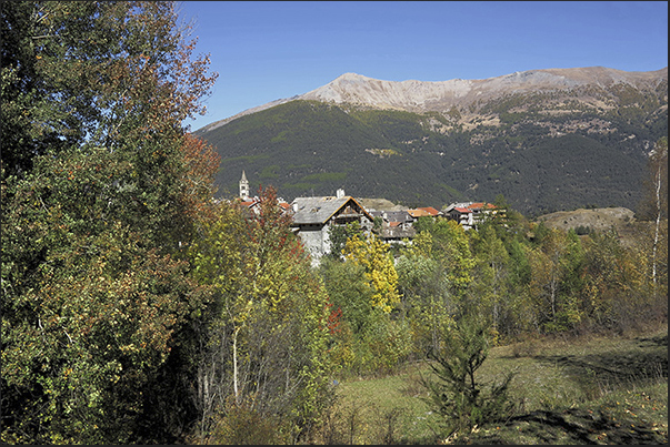 Chateau Beaulard alpine village (1387 m) behind Mount Jafferau (2805 m) Chateau Beaulard alpine village (1387 m) behind Mount Jafferau (2805 m)