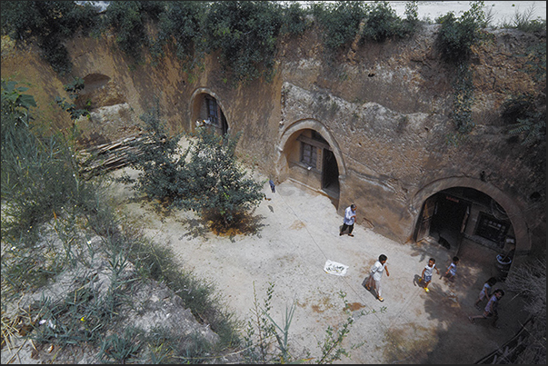 Village of peasants with homes excavated underground in Luoyang