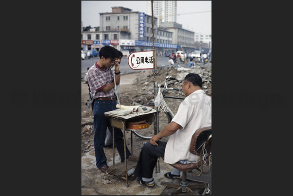 Tianjin Village. In the countryside you can still see the pay phone Tianjin Village. In the countryside you can still see the pay phone
