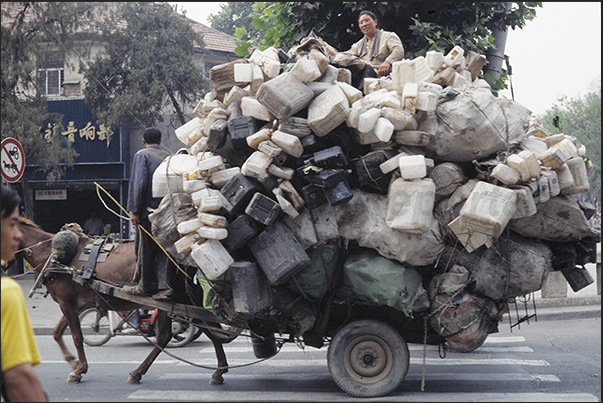 Tianjin Village. Plastic picker Tianjin Village. Plastic picker
