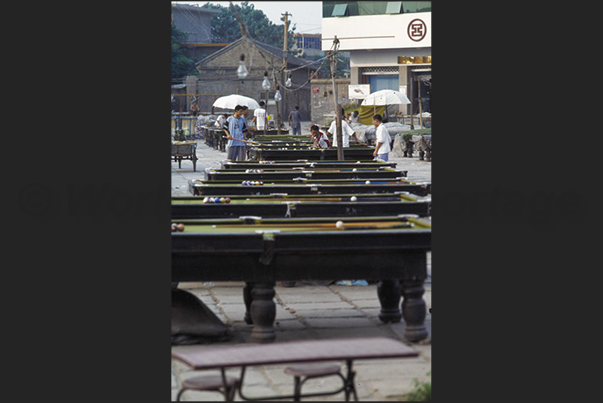 The game of billiards, one of the most common pastimes in the countryside