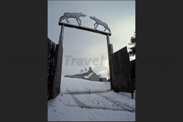 Entrance to the Wolves Gevaudan Park, a park in the woods of the Enfer Valley near the town of Marvejols Entrance to the Wolves Gevaudan Park, a park in the woods of the Enfer Valley near the town of Marvejols