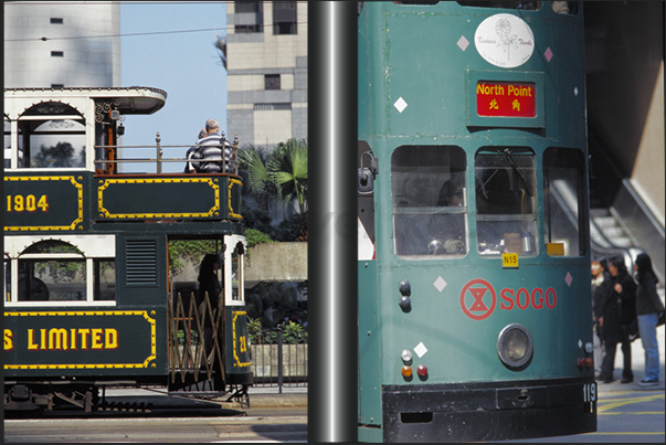 Ancient and modern ding-dings tram together on the streets of the city Ancient and modern ding-dings tram together on the streets of the city