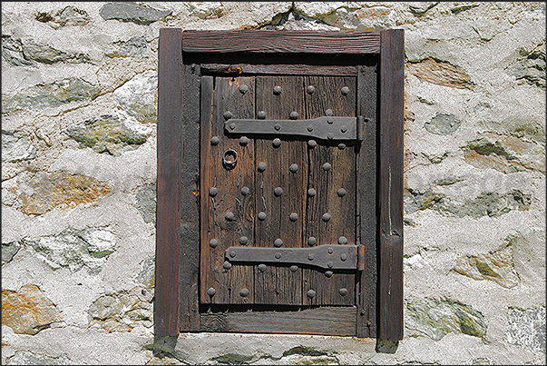 Wooden window in the part of the guest-quarters