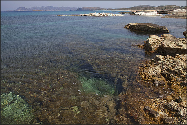 The jagged north coast of Milos in front of the Sarakinikos beaches The jagged north coast of Milos in front of the Sarakinikos beaches