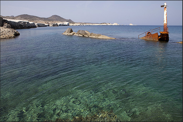 Rocky beaches of Sarakinikos. The remains of a shipwreck Rocky beaches of Sarakinikos. The remains of a shipwreck