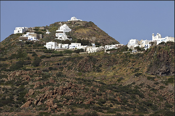 The village of Plaka, capital of the island, with the ancient Kastro that dominates the town The village of Plaka, capital of the island, with the ancient Kastro that dominates the town
