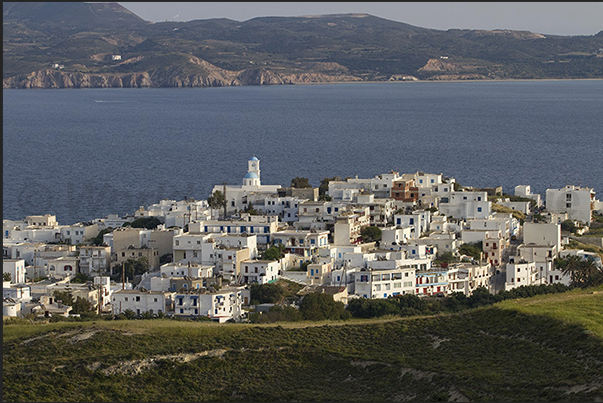 The town of Adamantas on the peninsula of Cape Kambanes, point of arrival of the ferries to and from other islands The town of Adamantas on the peninsula of Cape Kambanes, point of arrival of the ferries to and from other islands