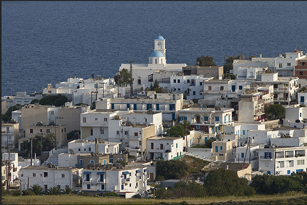 The town of Adamantas on the peninsula of Cape Kambanes, point of arrival of the ferries to and from other islands The town of Adamantas on the peninsula of Cape Kambanes, point of arrival of the ferries to and from other islands