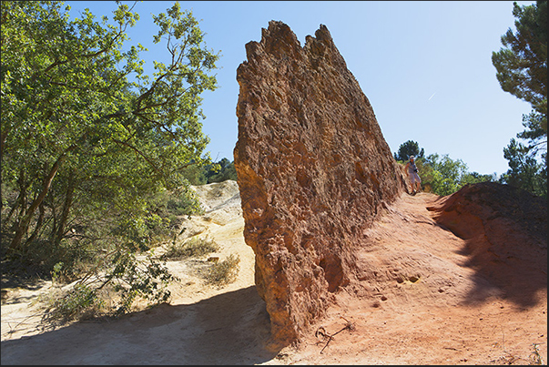 Walking you encounter particular rocky shapes created by rain and wind