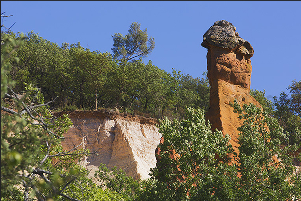 Walking you encounter particular rocky shapes created by rain and wind