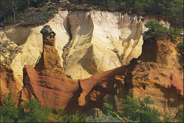 Pinnacles of fragile colored earths eroded by wind and rain. In the end, the rock will fall and the pinnacle will disappear