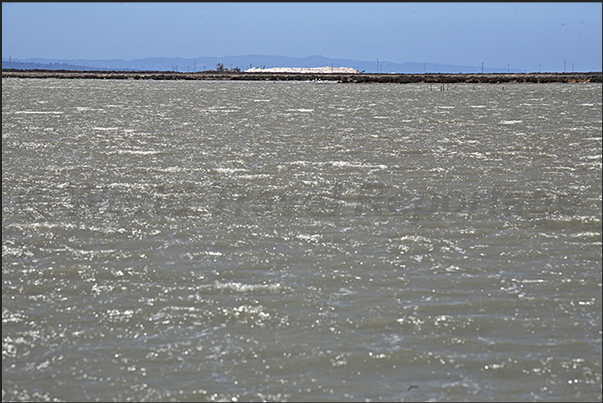 Salt pans in the Gulf of Palmas in front of Saint Antioco island Salt pans in the Gulf of Palmas in front of Saint Antioco island