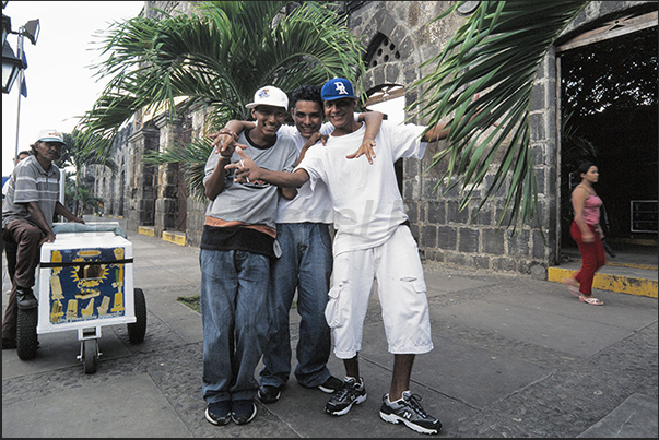 Masaya. Boys along the walls of the ancient Craft Market