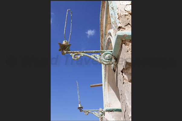 Ancient lamps once illuminated the facade of the Governor's Palace