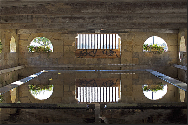 Village of Bourg. The large wash-house of the village Village of Bourg. The large wash-house of the village