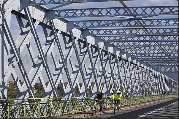Eiffel bridge. Built in steel in the late 19th century on the river Dordogne near the town of Cubzac-les-Ponts Eiffel bridge. Built in steel in the late 19th century on the river Dordogne near the town of Cubzac-les-Ponts