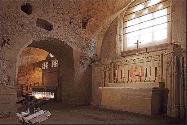 Village of Saint Emilion. The monolithic church (XII century) built by digging the tuff rock