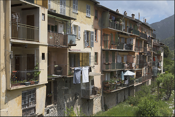 The ancient houses of Sospel overlook the river Bevera The ancient houses of Sospel overlook the river Bevera