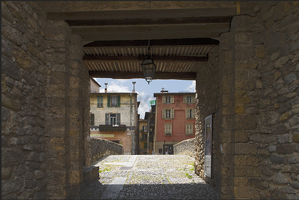 Sospel. Customs pass on the old medieval bridge on the river Bevera.