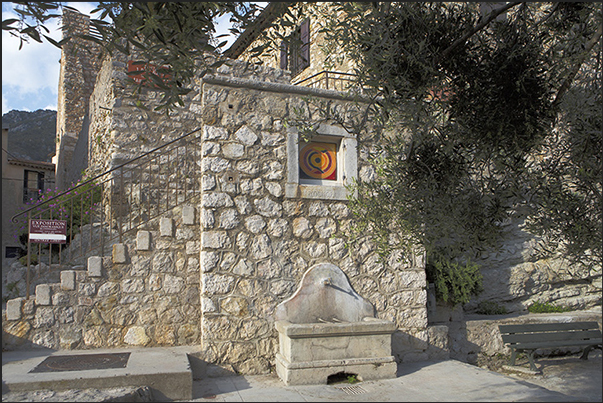 Gorbio. The fountain square and the small museum of the village Gorbio. The fountain square and the small museum of the village