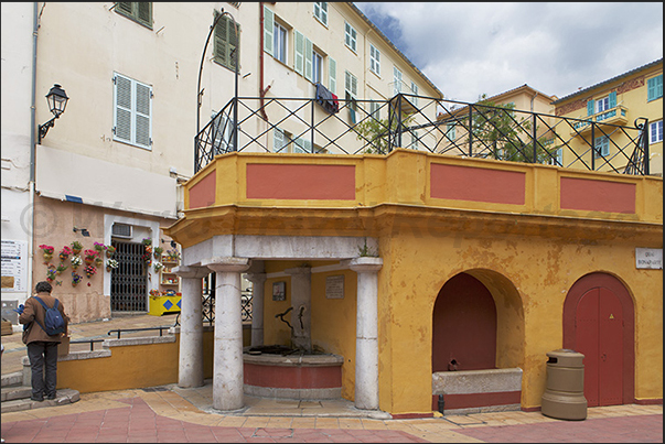 Fountain and ancient wash house in Du Cap Square