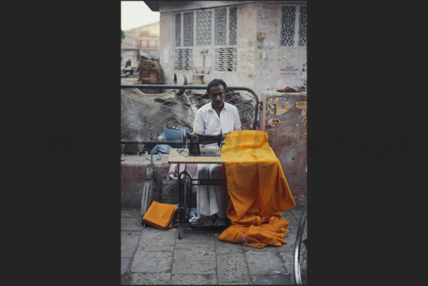 City of Jaipur. A tailor at work in the streets of the town City of Jaipur. A tailor at work in the streets of the town