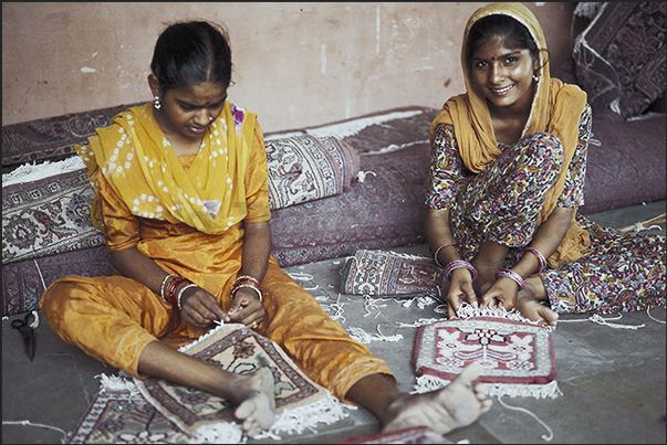 City of Jaipur. Girls at work during the construction of carpets City of Jaipur. Girls at work during the construction of carpets
