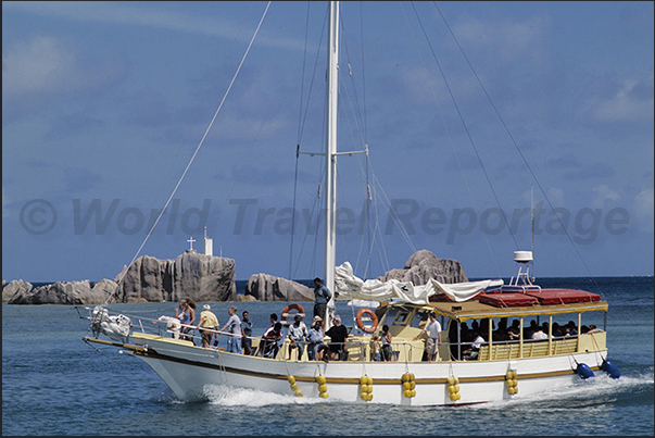 Boat with tourists during a mini cruise around the island