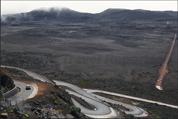 Route du Volcan, the road to the active volcano of Piton de la Fournaise. Plateau near Plaine des Cafres Route du Volcan, the road to the active volcano of Piton de la Fournaise. Plateau near Plaine des Cafres