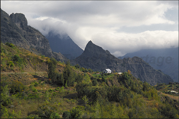 Cirque de Cilaos, the third extinct volcano of the island. Belier Pass area towards the village of Cilaos, central area of the island Cirque de Cilaos, the third extinct volcano of the island. Belier Pass area towards the village of Cilaos, central area of the island