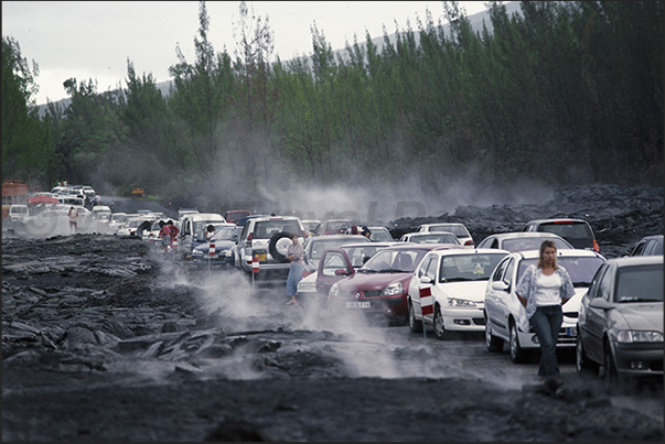 South east coast. Car in the lava exit from the Piton de la Fournaise volcano South east coast. Car in the lava exit from the Piton de la Fournaise volcano