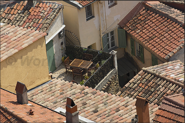 A quiet corner among the roofs of ancient houses A quiet corner among the roofs of ancient houses
