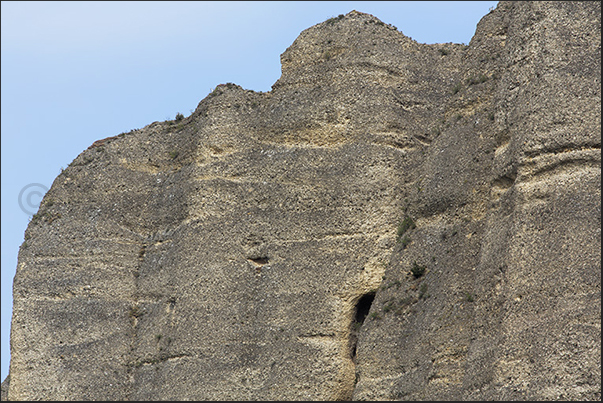 The walls formed by a rocky agglomerate along the river Durance characterize the place called Les Mees The walls formed by a rocky agglomerate along the river Durance characterize the place called Les Mees