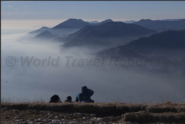 The west coast of the lake covered by the evening mists