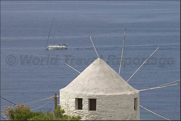 West Coast. Ancient and new mills converted to residence in the bay of Koundouros West Coast. Ancient and new mills converted to residence in the bay of Koundouros