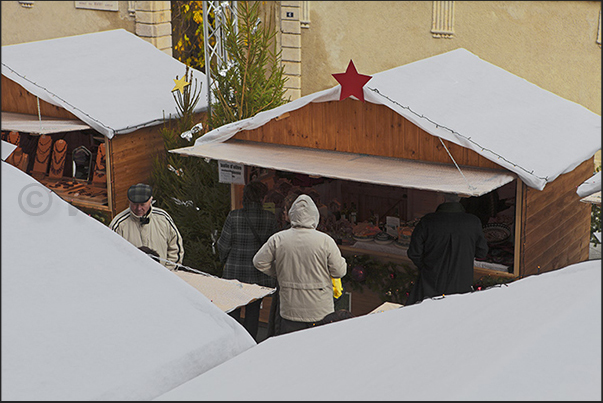Stalls of the Christmas markets under the castle walls Stalls of the Christmas markets under the castle walls