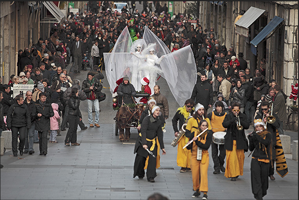 Christmas opening parade through the streets of the old town where there are squares and streets with Christmas markets Christmas opening parade through the streets of the old town where there are squares and streets with Christmas markets