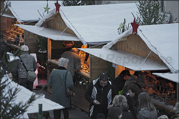 Stalls of the Christmas market under the castle walls Stalls of the Christmas market under the castle walls