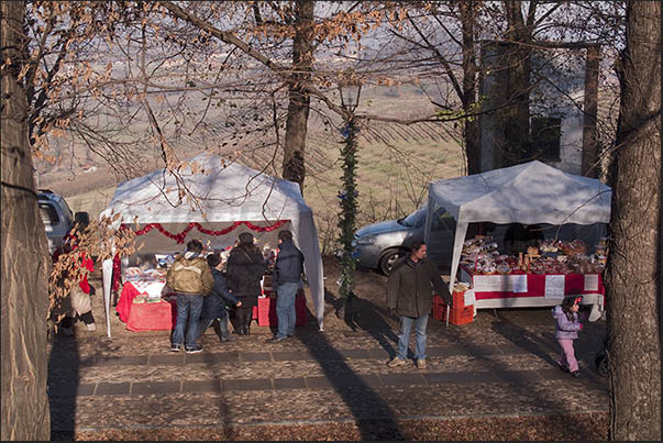 Christmas market stalls outside the walls of the Govone castle