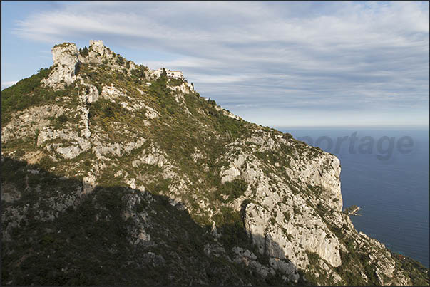 The western side of the rocky hill that hides the east-facing village